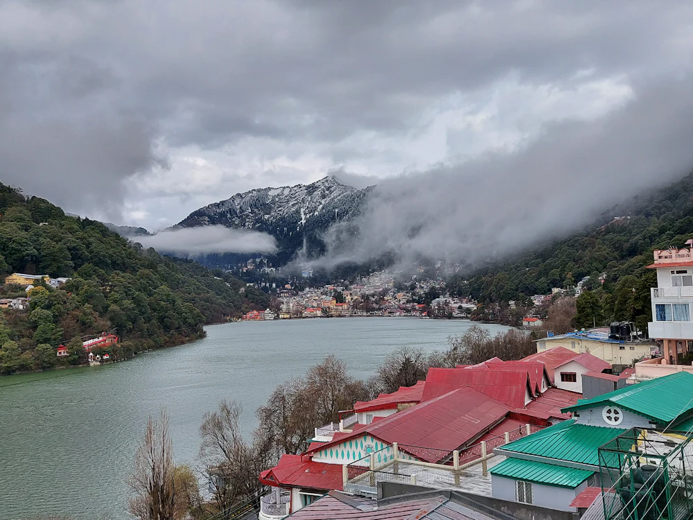 Red-roofed houses on the shore of Naini Lake