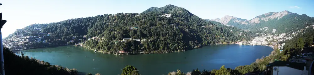 Wide panorama of Naini Lake, the hills and Nainital town